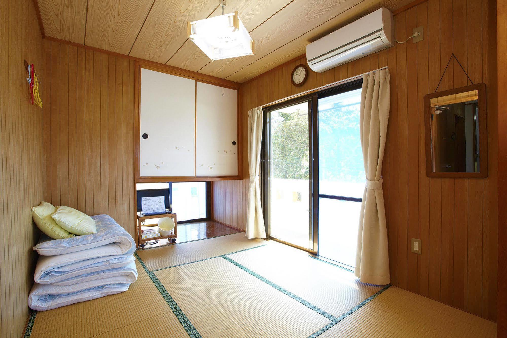 Hotel Minshuku Yadokari à Zamami Extérieur photo